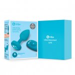 Korek analny wibrujący z klejnotem - B-Vibe Vibrating Jewel Plug S/M Niebieski