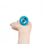 Korek analny wibrujący z klejnotem - B-Vibe Vibrating Jewel Plug S/M Niebieski